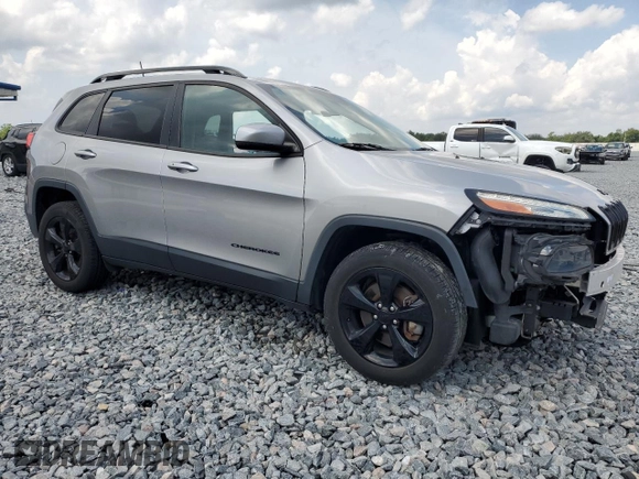 2016 Jeep Cherokee Limited with VIN 1C4PJMDS0GW317752, listed as a Copart auction lot 55691935 with 59,649 mi miles and Salvage Title. Bid and sale history available at DreamBid. Image 4.