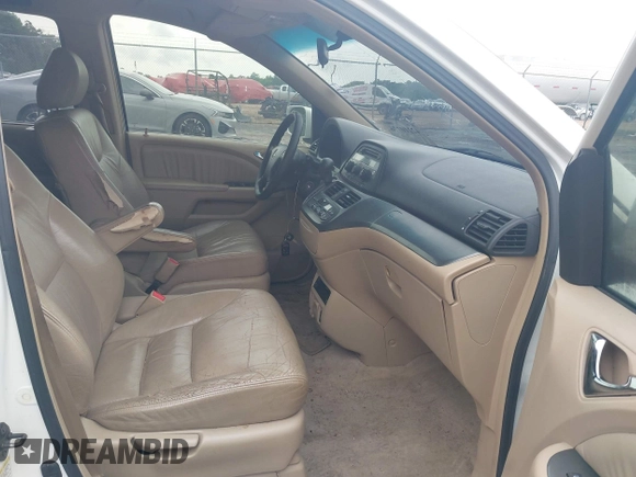 2005 Honda Odyssey EX-L with VIN 5FNRL38705B085917, listed as a IAAI auction lot 42210776 with 296,056 mi miles. Bid and sale history available at carsss.com. Image 5.