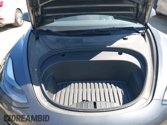 2023 Tesla Model 3 with VIN 5YJ3E1EA7PF673322, listed as a IAAI auction lot 42226767 with 18,367 mi miles and . Bid and sale history available at DreamBid. Image 10.