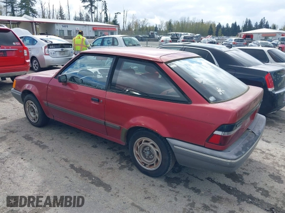 1989 Ford Escort z VIN 1FAPP9194KW249161, wystawiony jako IAAI lot #41988003 z przebiegiem 75 974 mil mil oraz . Historia ofert i sprzedaży dostępna na DreamBid. Obrazek 3.