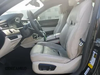 2014 BMW 7 Series 750i с VIN WBAYA8C57ED824970, выставлен на аукционе Copart как лот 61005925 с пробегом 144 457 миль миль и Чистый • Clean title. История ставок и продаж доступна на DreamBid. Изображение 7.