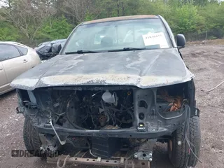 2009 Toyota Tacoma with VIN 5TENX22NX9Z593210, listed as a IAAI auction lot 41830477 with 314,010 mi miles. Bid and sale history available at carsss.com. Image 6.
