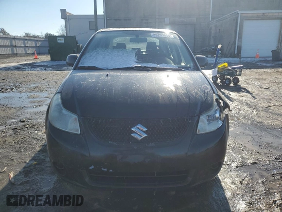 2012 Suzuki SX4 LE with VIN JS2YC5A3XC6303083, listed as a Copart auction lot 89265635 with 155,316 mi miles and Salvage Title. Bid and sale history available at carsss.com. Image 5.