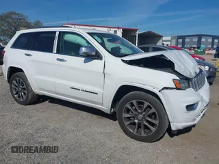 2017 Jeep Grand Cherokee Overland z VIN 1C4RJECG5HC959981, wystawiony jako IAAI lot #41638958 z przebiegiem 102 122 mil mil oraz . Historia ofert i sprzedaży dostępna na DreamBid. Obrazek 1.