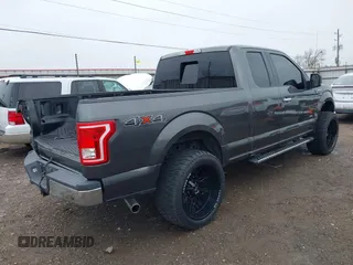 2015 Ford F-150 XLT with VIN 1FTEX1EP9FFC75210, listed as a IAAI auction lot 39041797 with 125,522 mi miles. Bid and sale history available at carsss.com. Image 4.