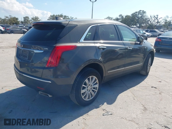 2019 Cadillac XT5 FWD with VIN 1GYKNARS5KZ143510, listed as a IAAI auction lot 41553279 with 53,943 mi miles and . Bid and sale history available at carsss.com. Image 4.