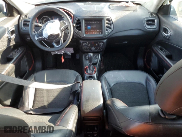 2021 Jeep Compass Trailhawk with VIN 3C4NJDDB2MT583833, listed as a Copart auction lot 58736675 with 67,090 mi miles and Salvage title. Bid and sale history available at DreamBid. Image 8.