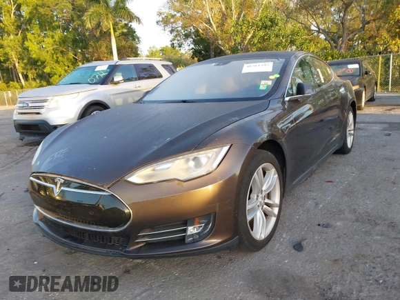 2014 Tesla Model S 60 z VIN 5YJSA1H19EFP51406, wystawiony jako IAAI lot #41561395 z przebiegiem Nie podano mil oraz . Historia ofert i sprzedaży dostępna na DreamBid. Obrazek 6.
