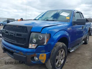2009 Ford F-150 STX with VIN 1FTRX14WX9FB42387, listed as a IAAI auction lot 41972784 with 212,781 mi miles. Bid and sale history available at carsss.com. Image 2.