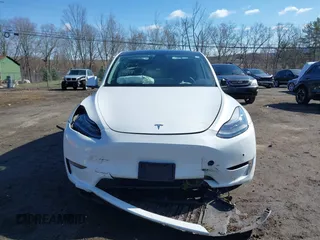 2021 Tesla Model Y Long Range with VIN 5YJYGDEE9MF239726, listed as a IAAI auction lot 41952158 with 37,088 mi miles and . Bid and sale history available at DreamBid. Image 13.