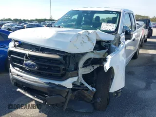 2022 Ford F-150 XL z VIN 1FTFX1E54NKD86627, wystawiony jako IAAI lot #41362024 z przebiegiem 32 712 mil mil oraz . Historia ofert i sprzedaży dostępna na DreamBid. Obrazek 6.