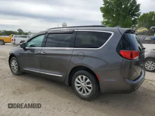 2017 Chrysler Pacifica Touring L with VIN 2C4RC1BG7HR569315, listed as a Copart auction lot 47018605 with 131,519 mi miles and Salvage Title. Bid and sale history available at DreamBid. Image 2.