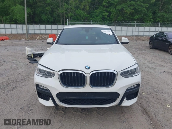 2019 BMW X4 xDrive30i with VIN 5UXUJ3C52KLG54945, listed as a IAAI auction lot 42083434 with 153,956 mi miles and . Bid and sale history available at DreamBid. Image 13.