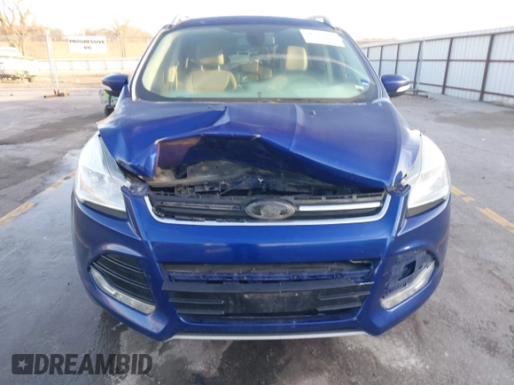 2014 Ford Escape Titanium with VIN 1FMCU9JX4EUD30964, listed as a IAAI auction lot 41772153 with 179,481 mi miles and . Bid and sale history available at DreamBid. Image 12.