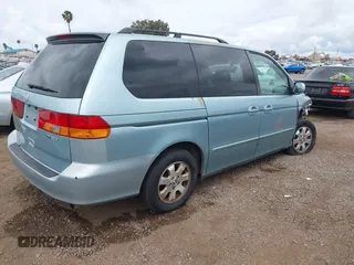 2004 Honda Odyssey EX-L with VIN 5FNRL18064B060817, listed as a IAAI auction lot 42032796 with 200,999 mi miles and . Bid and sale history available at DreamBid. Image 4.