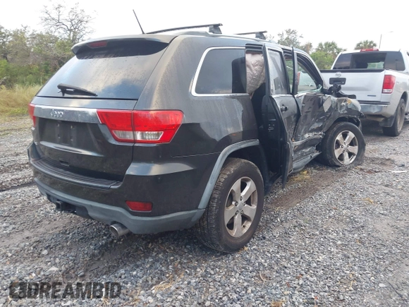 2011 Jeep Grand Cherokee Laredo z VIN 1J4RR4GG2BC737140, wystawiony jako IAAI lot #41217587 z przebiegiem Nie podano mil oraz . Historia ofert i sprzedaży dostępna na DreamBid. Obrazek 4.