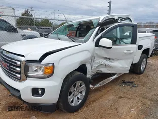 2015 GMC Canyon 2WD SLE with VIN 1GTG5BE33F1132736, listed as a IAAI auction lot 41094687 with 26,185 mi miles. Bid and sale history available at carsss.com. Image 2.