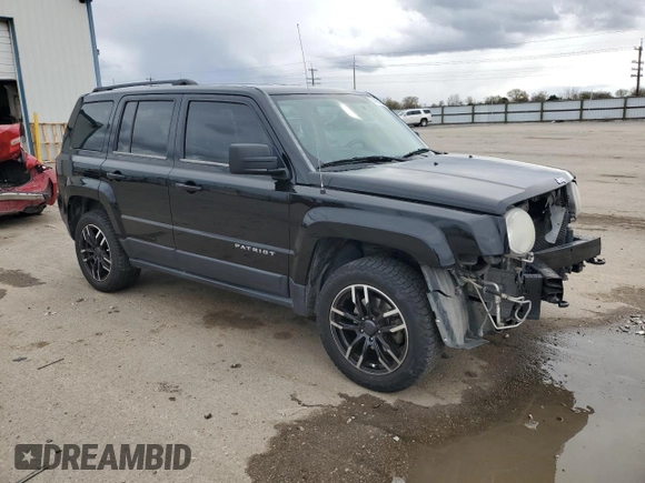 2014 Jeep Patriot Latitude with VIN 1C4NJRFB4ED689363, listed as a Copart auction lot 51185125 with 132,340 mi miles and Salvage Title. Bid and sale history available at carsss.com. Image 4.