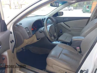 2007 Nissan Altima 2.5 with VIN 1N4AL21E77N491476, listed as a IAAI auction lot 42082834 with 284,079 mi miles. Bid and sale history available at carsss.com. Image 5.