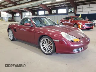 1999 Porsche Boxster z VIN WP0CA298XXU626611, wystawiony jako Copart lot #50950385 z przebiegiem 101 051 mil mil oraz Czysty tytuł • Clean title. Historia ofert i sprzedaży dostępna na DreamBid. Obrazek 4.