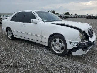2001 Mercedes-Benz E-Class with VIN WDBJF70J51B332881, listed as a Copart auction lot 63487844 with 216,080 mi miles and Salvage Title. Bid and sale history available at carsss.com. Image 4.