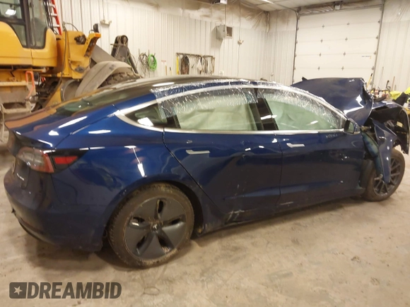 2018 Tesla Model 3 Long Range Battery with VIN 5YJ3E1EB7JF086201, listed as a IAAI auction lot 41965193 with 99,231 mi miles and . Bid and sale history available at DreamBid. Image 13.