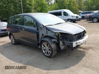 2012 Mazda 5 Touring z VIN JM1CW2CL5C0126744, wystawiony jako IAAI lot #42385667 z przebiegiem 140 150 mil mil oraz . Historia ofert i sprzedaży dostępna na DreamBid. Obrazek 1.
