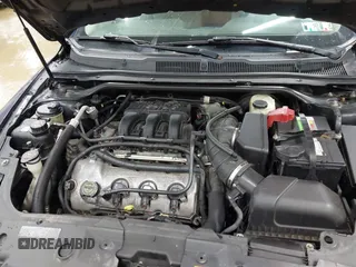 2011 Ford Taurus SE with VIN 1FAHP2DW4BG187235, listed as a IAAI auction lot 41942952 with 162,083 mi miles. Bid and sale history available at carsss.com. Image 10.