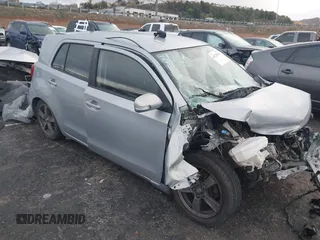 2013 Scion xD with VIN JTKKUPB40D1036883, listed as a IAAI auction lot 41729934 with 1 mi miles. Bid and sale history available at carsss.com. Image 1.
