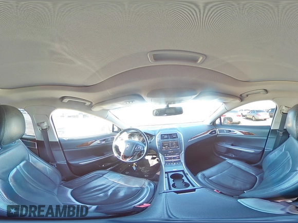 2015 Lincoln MKZ z VIN 3LN6L2G9XFR610736, wystawiony jako Copart lot #80662274 z przebiegiem 101 441 mil mil oraz Szkoda całkowita • Salvage title. Historia ofert i sprzedaży dostępna na DreamBid. Obrazek 13.
