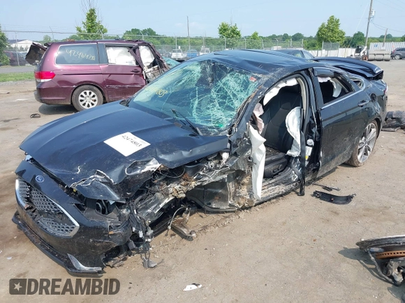 2019 Ford Fusion Titanium with VIN 3FA6P0D92KR247270, listed as a IAAI auction lot 42474803 with Not provided miles and . Bid and sale history available at DreamBid. Image 16.
