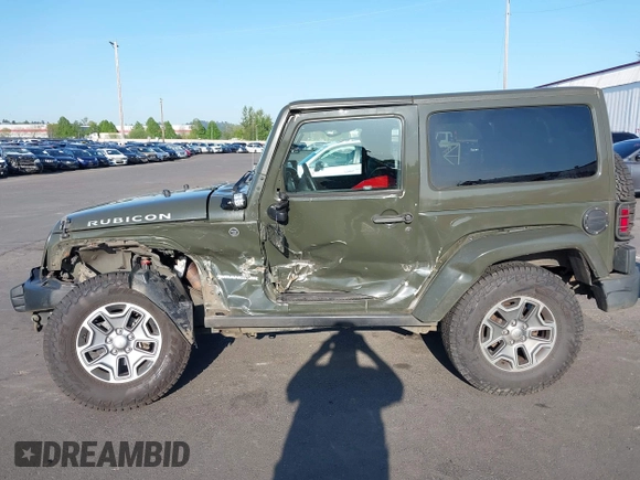 2015 Jeep Wrangler Rubicon Hard Rock with VIN 1C4BJWCGXFL771669, listed as a IAAI auction lot 42057423 with 36,996 mi miles and . Bid and sale history available at DreamBid. Image 15.
