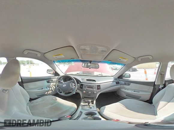 2009 Kia Optima LX z VIN KNAGE228795334599, wystawiony jako Copart lot #59276515 z przebiegiem 180 399 mil mil oraz Szkoda całkowita • Salvage title. Historia ofert i sprzedaży dostępna na DreamBid. Obrazek 15.