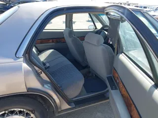 1995 Buick LeSabre Custom with VIN 1G4HP52L5SH487893, listed as a IAAI auction lot 41680378 with 121,742 mi miles. Bid and sale history available at carsss.com. Image 8.
