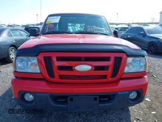 2011 Ford Ranger XLT with VIN 1FTLR4FE5BPA57057, listed as a IAAI auction lot 41995162 with 238,987 mi miles. Bid and sale history available at carsss.com. Image 12.