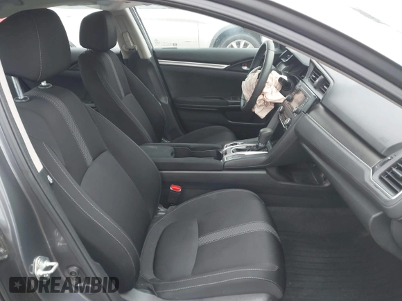 2020 Honda Civic LX with VIN 2HGFC2F63LH567698, listed as a IAAI auction lot 42354886 with 70,977 mi miles and . Bid and sale history available at DreamBid. Image 5.
