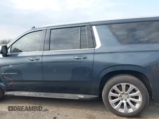 2021 Chevrolet Suburban Premier with VIN 1GNSKFKDXMR295929, listed as a IAAI auction lot 42033006 with 46,733 mi miles and . Bid and sale history available at DreamBid. Image 14.