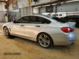 2015 BMW 4 Series 428i z VIN WBA4A5C51FG052009, wystawiony jako Copart lot #89110235 z przebiegiem 156 675 mil mil oraz Szkoda całkowita • Salvage title. Historia ofert i sprzedaży dostępna na DreamBid. Obrazek 2.
