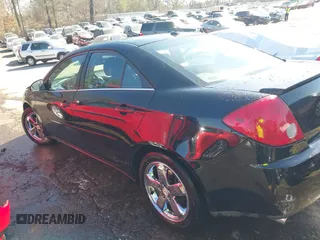 2005 Pontiac G6 GT with VIN 1G2ZH548154165427, listed as a IAAI auction lot 41650622 with 149,187 mi miles. Bid and sale history available at carsss.com. Image 14.