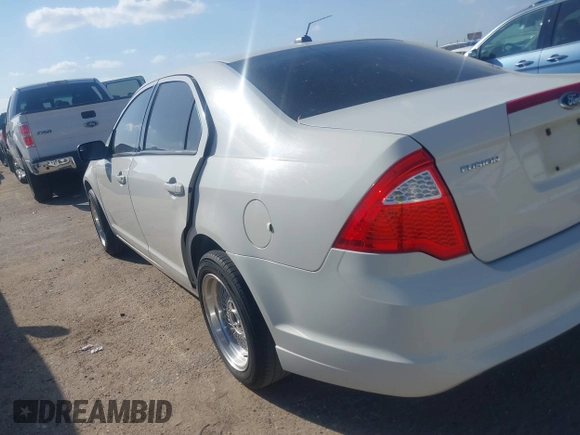 2011 Ford Fusion S with VIN 3FAHP0GA4BR268927, listed as a IAAI auction lot 41772569 with 305,339 mi miles. Bid and sale history available at carsss.com. Image 3.