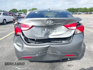 2013 Hyundai Elantra GLS z VIN 5NPDH4AE8DH253510, wystawiony jako IAAI lot #41625675 z przebiegiem 122 914 mil mil oraz . Historia ofert i sprzedaży dostępna na DreamBid. Obrazek 6.