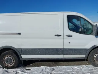 2019 Ford Transit with VIN 1FTYE1YM7KKA23171, listed as a IAAI auction lot 41260744 with 114,715 mi miles and . Bid and sale history available at DreamBid. Image 12.