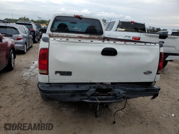 2000 Ford Super Duty F-250 XL with VIN 1FTNF20L8YEA71116, listed as a Copart auction lot 73739324 with 303,338 mi miles and Salvage Title. Bid and sale history available at carsss.com. Image 6.