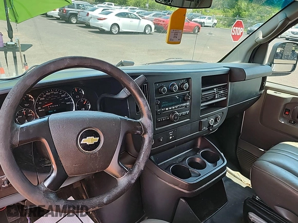 2015 Chevrolet Express Cargo with VIN 1GCWGFCF0F1248728, listed as a IAAI auction lot 42561489 with 263,640 mi miles and . Bid and sale history available at DreamBid. Image 12.