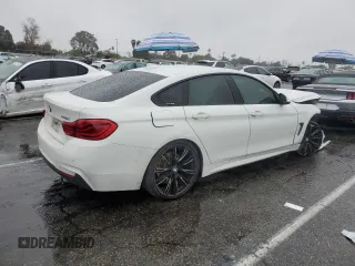2018 BMW 4 Series 440i with VIN WBA4J5C54JBF07105, listed as a Copart auction lot 45203205 with 62,112 mi miles and Salvage Title. Bid and sale history available at DreamBid. Image 3.