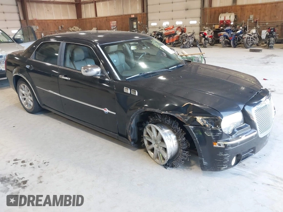 2006 Chrysler 300 C with VIN 2C3KA63H06H421414, listed as a IAAI auction lot 42144274 with 118,692 mi miles. Bid and sale history available at carsss.com. Image 1.