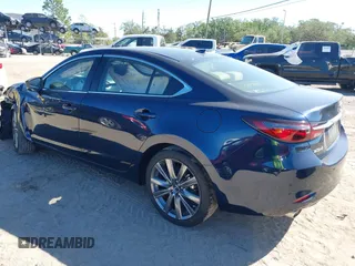 2021 Mazda 6 Grand Touring with VIN JM1GL1TY3M1619771, listed as a IAAI auction lot 40964809 with 25,816 mi miles and . Bid and sale history available at DreamBid. Image 3.