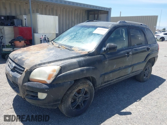 2005 Kia Sportage LX with VIN KNDJF723057061348, listed as a IAAI auction lot 42110933 with 183,490 mi miles and . Bid and sale history available at carsss.com. Image 2.