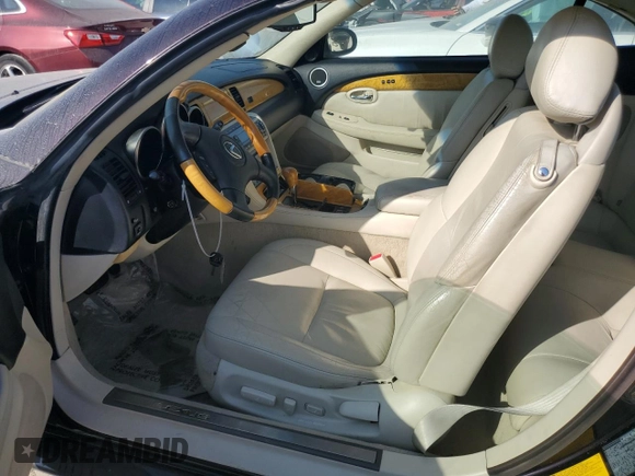 2002 Lexus SC 430 with VIN JTHFN48Y520034983, listed as a Copart auction lot 74084354 with 88,979 mi miles and Salvage Title. Bid and sale history available at DreamBid. Image 7.