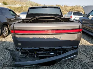 2023 Rivian R1T Adventure with VIN 7FCTGAAA5PN023738, listed as a Copart auction lot 63131724 with 141 mi miles and Salvage Title. Bid and sale history available at carsss.com. Image 6.